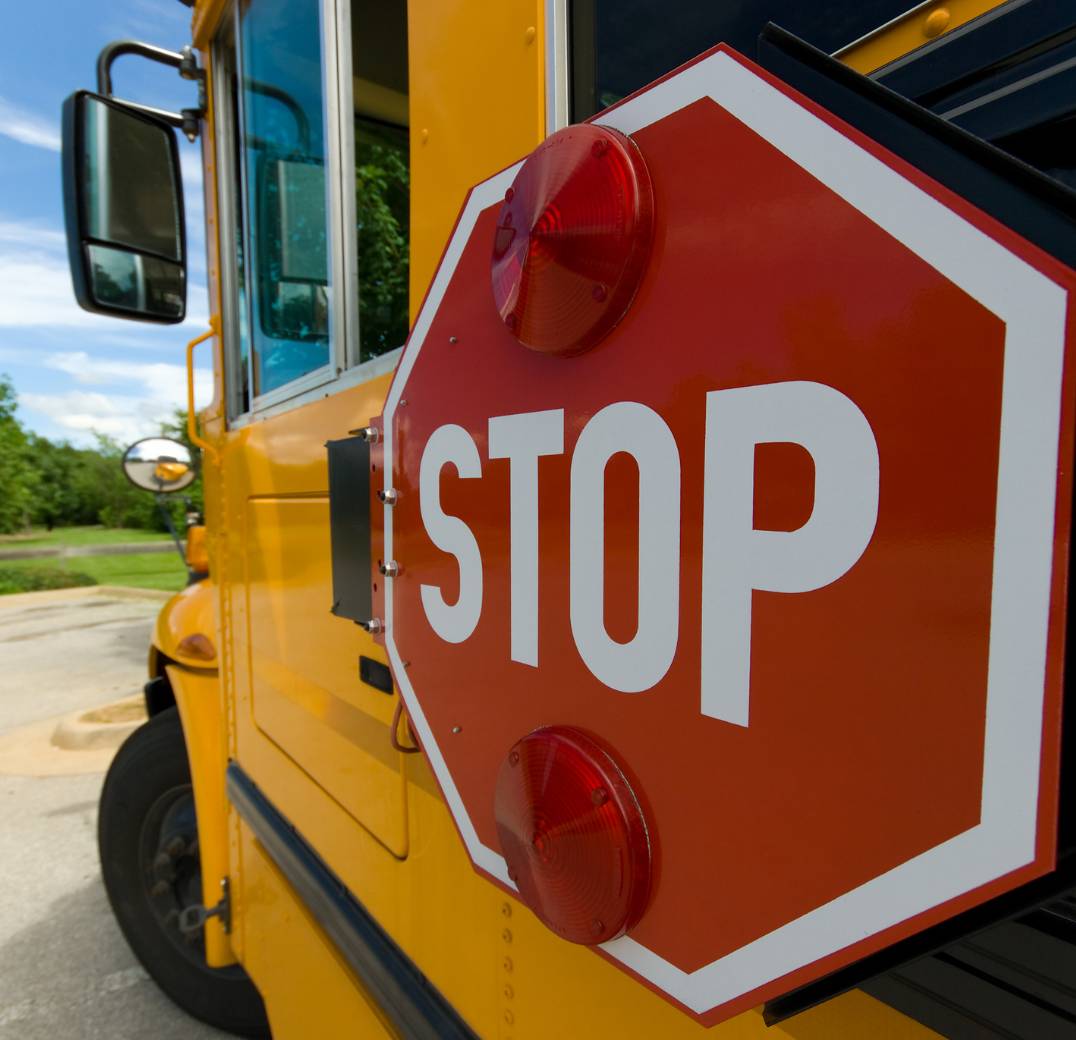 Photo of school bus stop sign arm